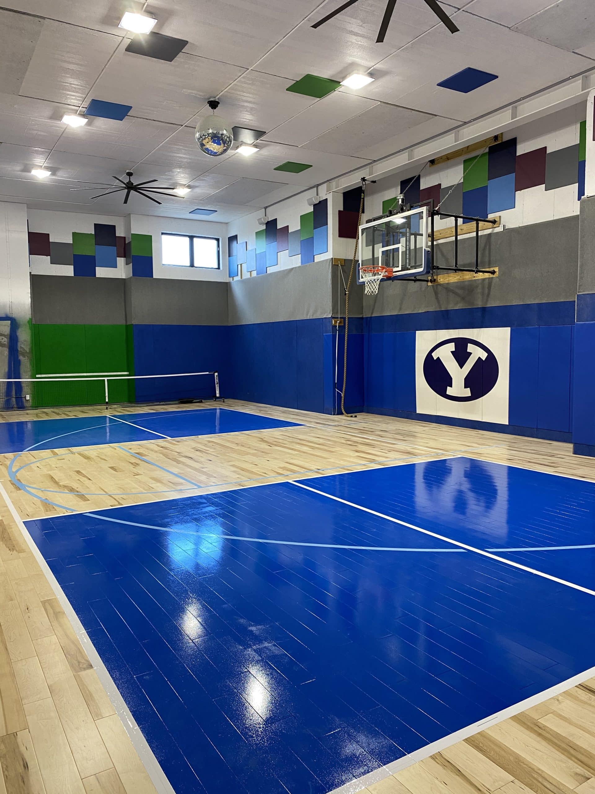 Bright blue court with crisp white lines for court markings.