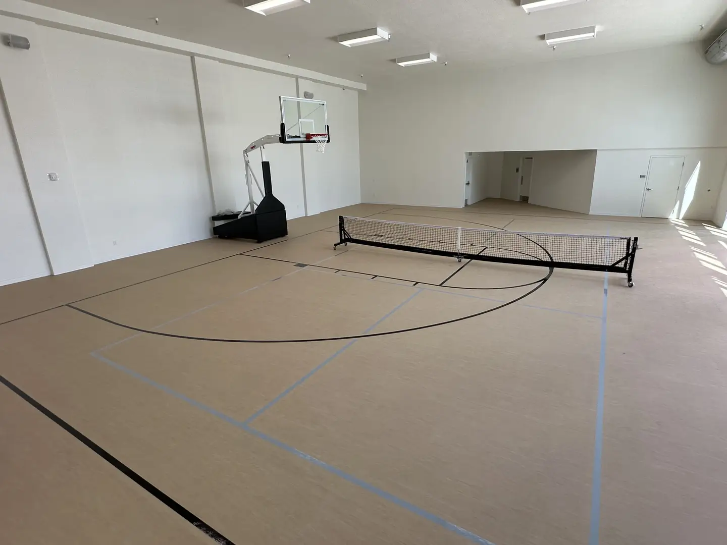 Indoor basketball court with portable net