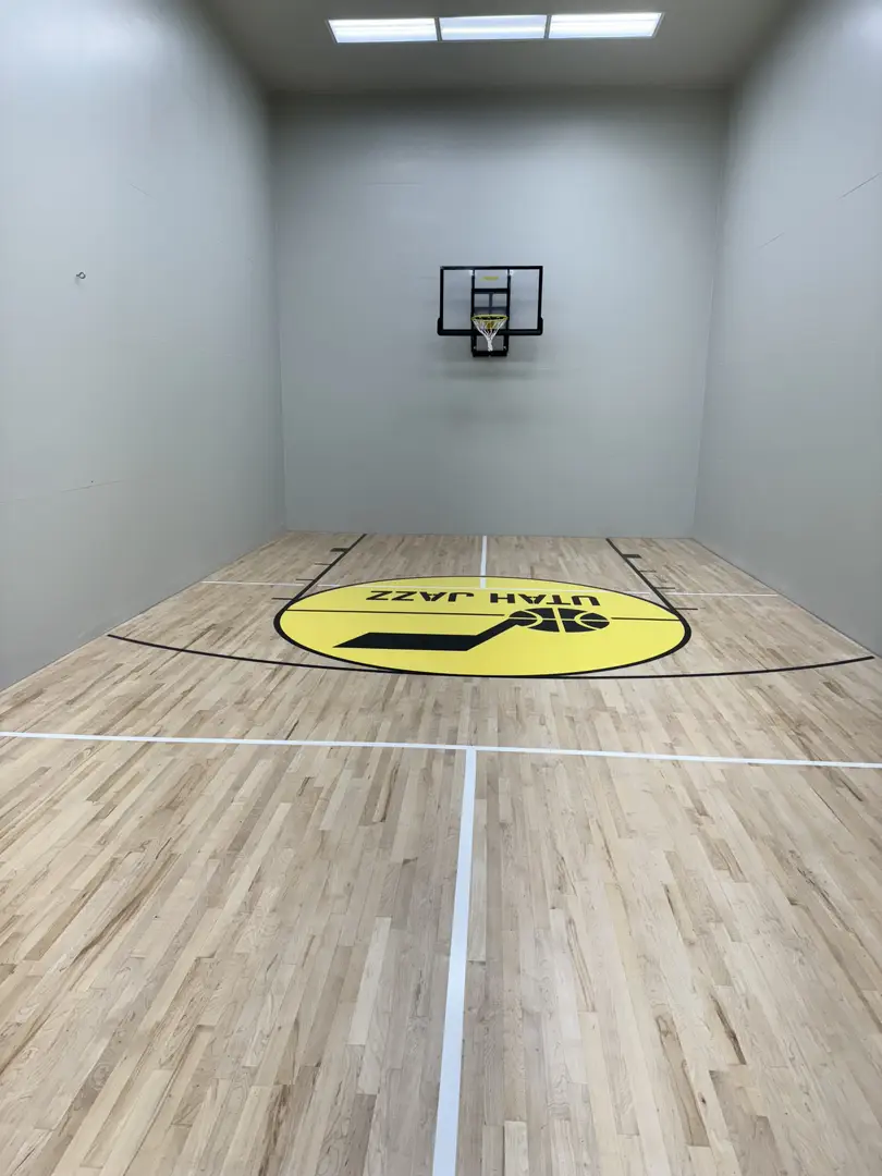 Utah Jazz basketball court with logo and mini hoop