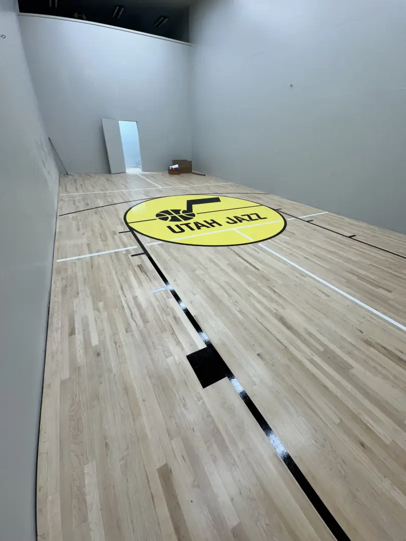 Utah Jazz logo on a newly installed basketball court